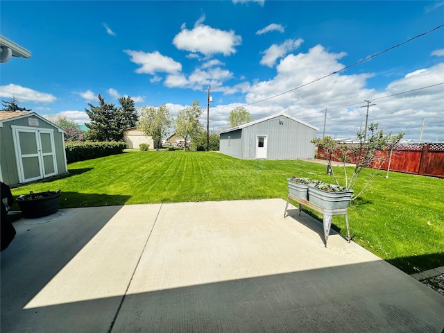 47 3rd Ave S, Stanford, MT 59479 - view of yard with a patio, an outbuilding, and a storage unit