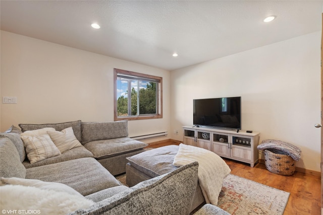 155 Spring Ln, Eureka, MT 59917 - living area with light wood finished floors, baseboard heating, and recessed lighting