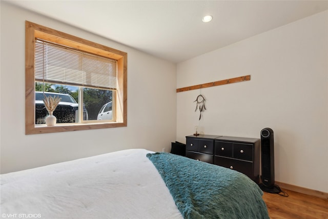 155 Spring Ln, Eureka, MT 59917 - bedroom with baseboards, wood finished floors, and recessed lighting