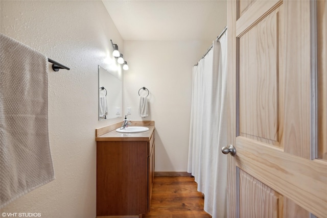 155 Spring Ln, Eureka, MT 59917 - full bath featuring wood finished floors and vanity