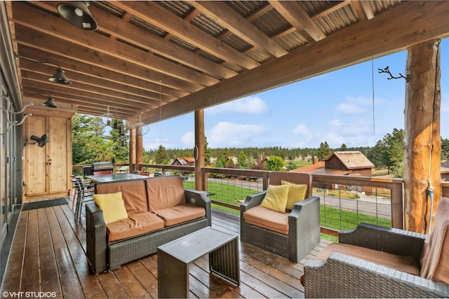 62 Wilderness Lodge Rd, Eureka, MT 59917 - wooden terrace with an outdoor living space