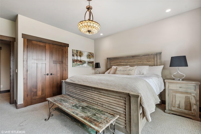 62 Wilderness Lodge Rd, Eureka, MT 59917 - bedroom with a closet, baseboards, recessed lighting, and light colored carpet