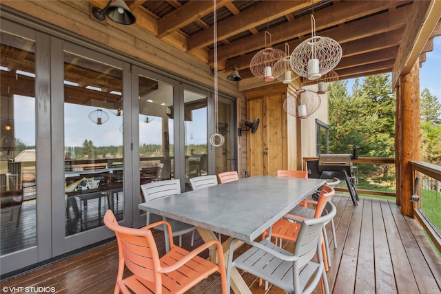 62 Wilderness Lodge Rd, Eureka, MT 59917 - sunroom featuring french doors, a notable chandelier, and beam ceiling