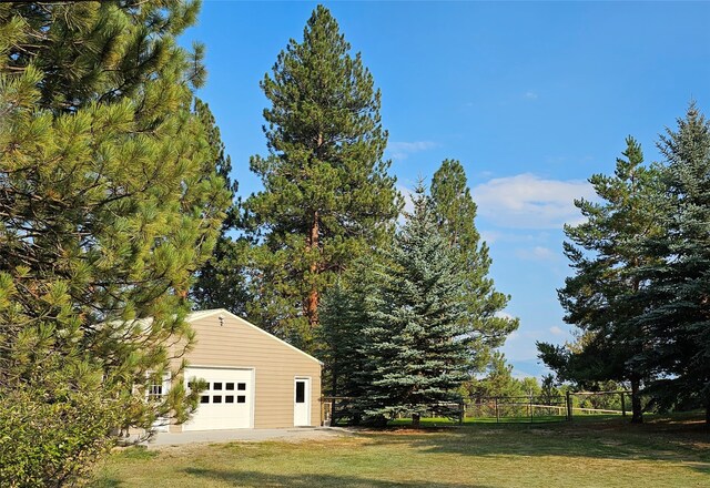 NHN Bears Rd, Stevensville, MT 59870 - view of yard featuring an outbuilding, a garage, and fence