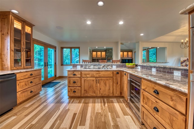 NHN Bears Rd, Stevensville, MT 59870 - kitchen featuring recessed lighting, wine cooler, stainless steel dishwasher, and light wood-type flooring