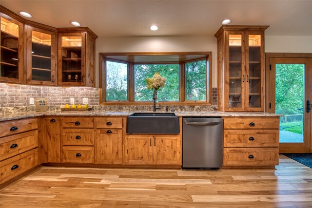 NHN Bears Rd, Stevensville, MT 59870 - kitchen with light wood-style floors, a sink, backsplash, and dishwasher
