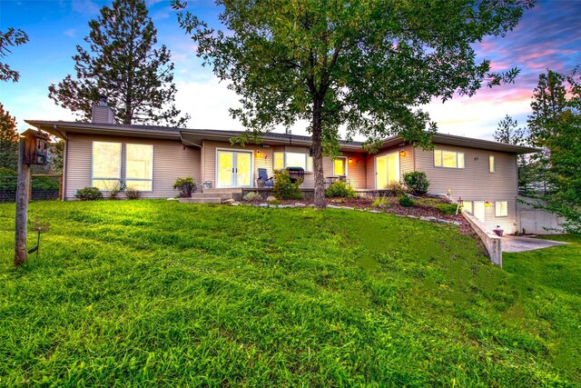 NHN Bears Rd, Stevensville, MT 59870 - ranch-style home featuring a front lawn, a chimney, and fence