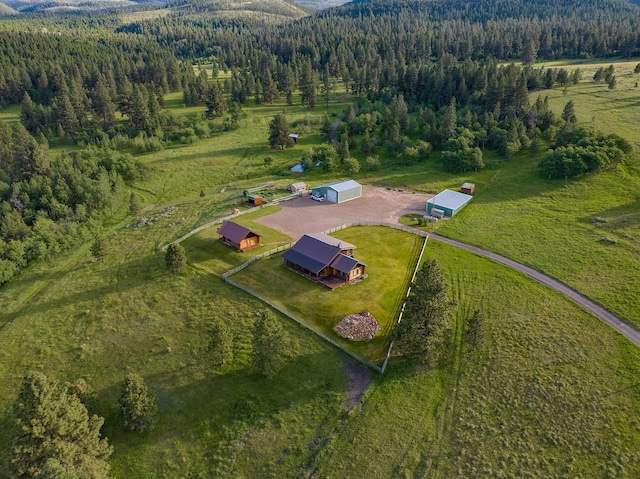 587 Cozy Ln, Helmville, MT 59843 - drone / aerial view with a rural view and a forest view