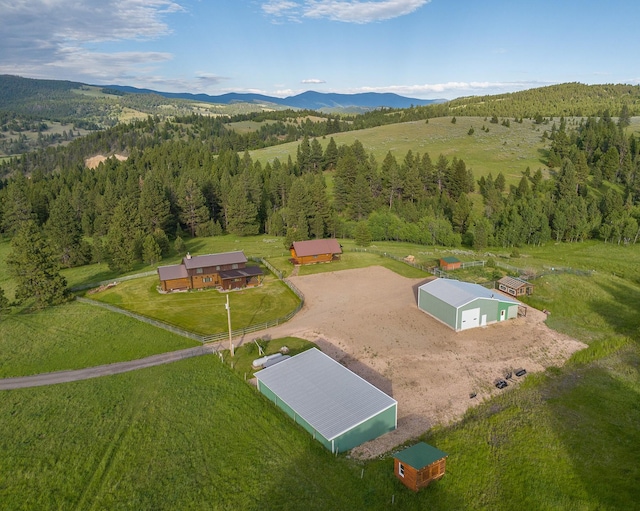 587 Cozy Ln, Helmville, MT 59843 - bird's eye view with a mountain view and a view of trees