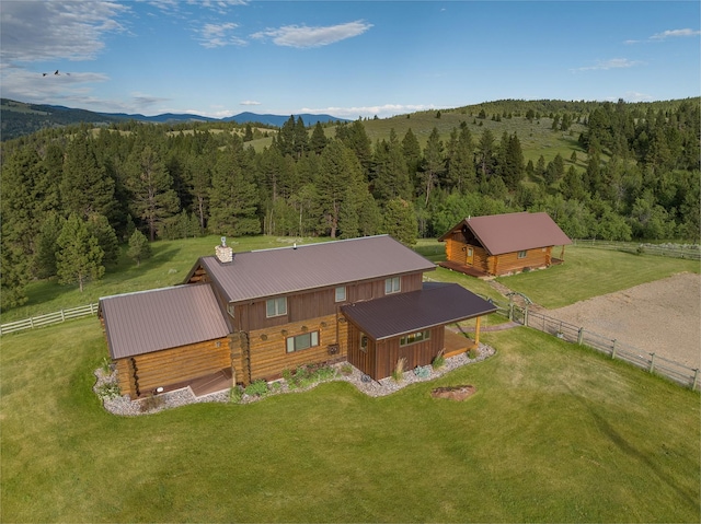 587 Cozy Ln, Helmville, MT 59843 - bird's eye view featuring a wooded view and a mountain view
