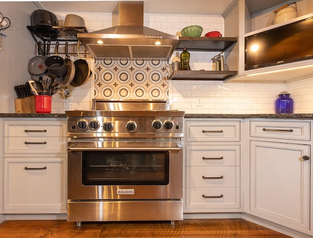 587 Cozy Ln, Helmville, MT 59843 - kitchen with wall chimney range hood, backsplash, open shelves, and stainless steel range