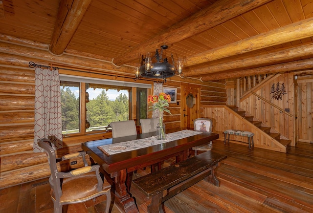 587 Cozy Ln, Helmville, MT 59843 - dining space with stairs, a notable chandelier, beam ceiling, hardwood / wood-style floors, and wood ceiling