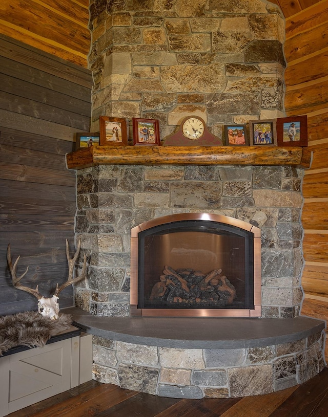 587 Cozy Ln, Helmville, MT 59843 - room details with a fireplace and wood finished floors
