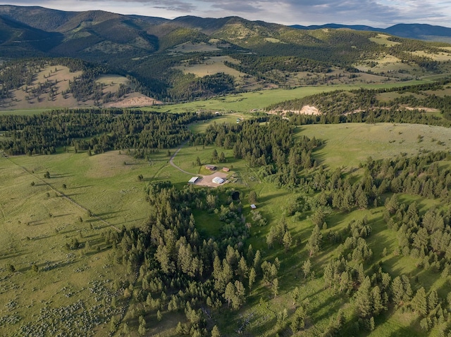 587 Cozy Ln, Helmville, MT 59843 - birds eye view of property featuring a rural view and a mountain view