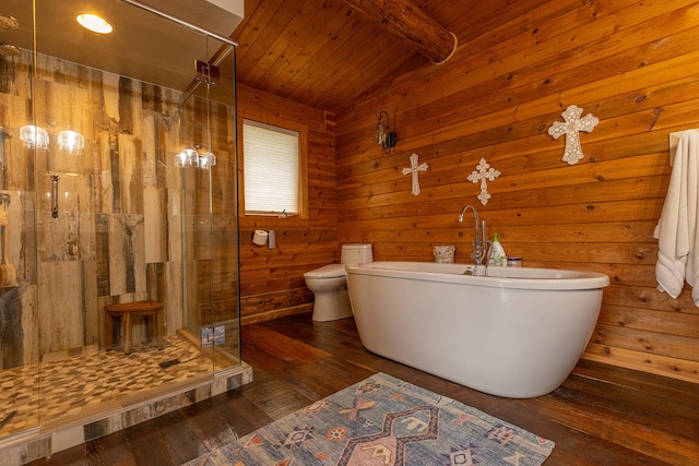 587 Cozy Ln, Helmville, MT 59843 - full bathroom featuring beamed ceiling, a shower stall, hardwood / wood-style flooring, toilet, and a freestanding bath