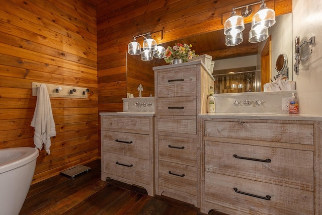 587 Cozy Ln, Helmville, MT 59843 - full bath featuring vanity, a shower with door, wooden walls, a notable chandelier, and wood finished floors