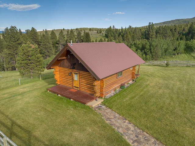 587 Cozy Ln, Helmville, MT 59843 - birds eye view of property featuring a wooded view