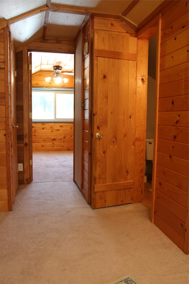 28 Princeton Rd, Philipsburg, MT 59858 - corridor with light carpet, vaulted ceiling, and wooden walls