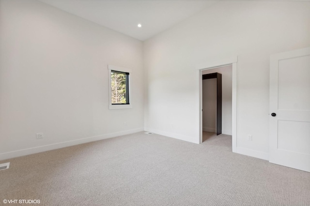 34 Grizzly Ct, Bigfork, MT 59911 - unfurnished room featuring carpet, baseboards, and recessed lighting