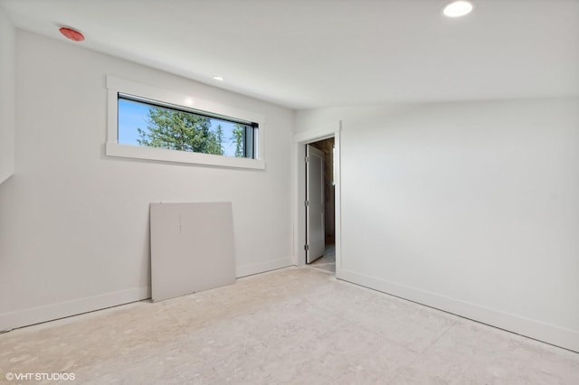 34 Grizzly Ct, Bigfork, MT 59911 - unfurnished room featuring baseboards and recessed lighting