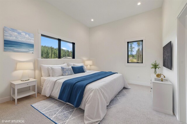 34 Grizzly Ct, Bigfork, MT 59911 - bedroom with light carpet and recessed lighting