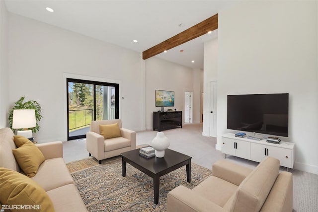 34 Grizzly Ct, Bigfork, MT 59911 - living room with light colored carpet, recessed lighting, beamed ceiling, a towering ceiling, and baseboards
