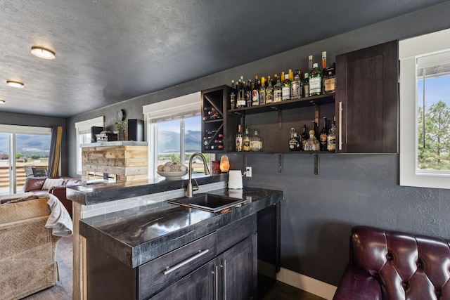 4528 Adellon Ct, Stevensville, MT 59870 - indoor wet bar with wood finished floors