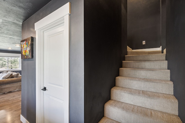 4528 Adellon Ct, Stevensville, MT 59870 - stairs with wood finished floors