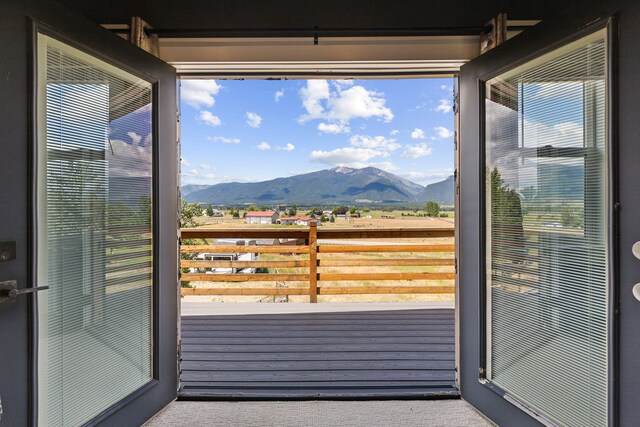 4528 Adellon Ct, Stevensville, MT 59870 - doorway to outside with a mountain view