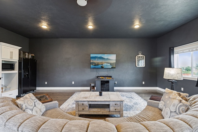 4528 Adellon Ct, Stevensville, MT 59870 - living room featuring wood finished floors and recessed lighting