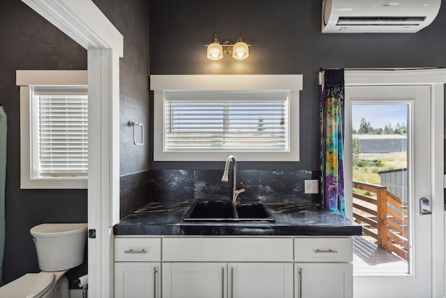 4528 Adellon Ct, Stevensville, MT 59870 - bathroom with a wall mounted air conditioner and vanity
