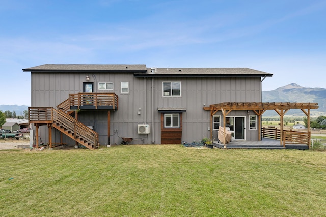 4528 Adellon Ct, Stevensville, MT 59870 - back of house featuring a pergola, a deck with mountain view, and stairs