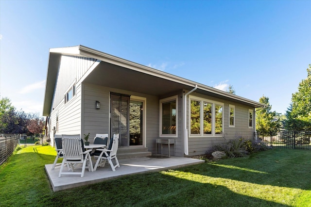 805 Broken Choker Ln, Bigfork, MT 59911 - back of property with a patio