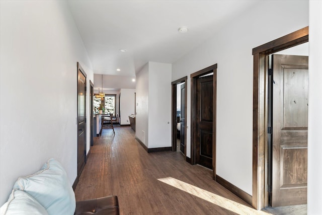 805 Broken Choker Ln, Bigfork, MT 59911 - hall featuring wood finished floors, baseboards, and recessed lighting