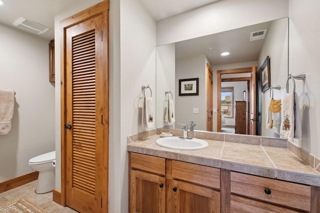 6205 Davos Ln Unit B, Whitefish, MT 59937 - bathroom with vanity and recessed lighting