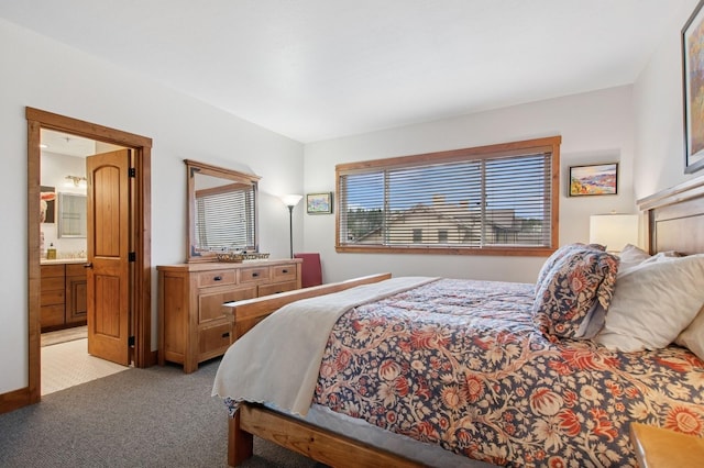 6205 Davos Ln Unit B, Whitefish, MT 59937 - bedroom with light carpet and ensuite bath