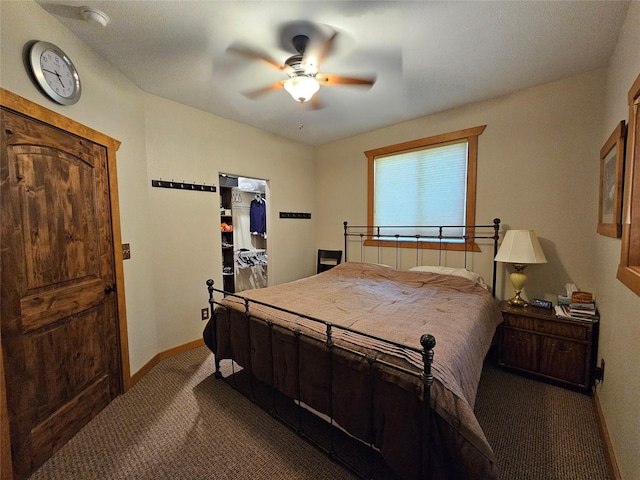 bedroom featuring a ceiling fan, baseboards, and dark carpet