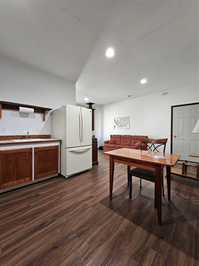 dining room featuring recessed lighting and dark wood finished floors