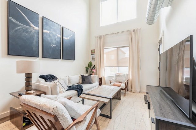 15 Sagebrush Ct Unit B, Whitefish, MT 59937 - living room with a high ceiling and baseboards