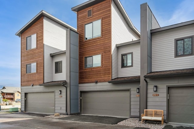 15 Sagebrush Ct Unit B, Whitefish, MT 59937 - back of property featuring a garage