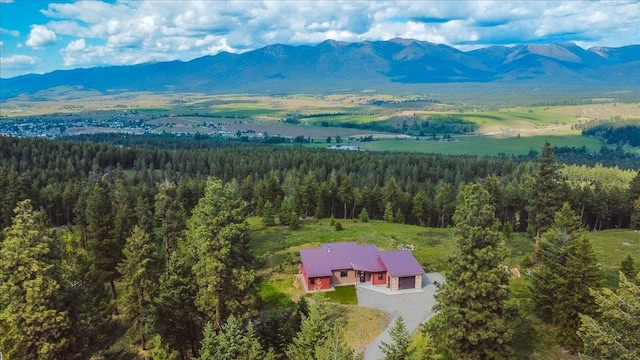563 Riding High Dr, Eureka, MT 59917 - aerial view of property and surrounding area featuring a mountainous background