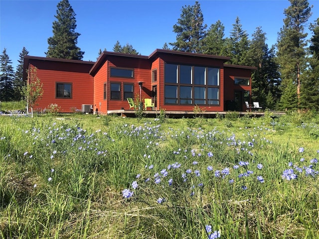 563 Riding High Dr, Eureka, MT 59917 - view of front of property with central AC unit