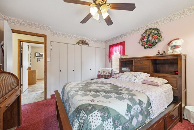 2804 Harmony Ct, Missoula, MT 59801 - bedroom with dark carpet, two closets, and a ceiling fan