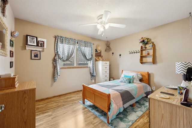 2804 Harmony Ct, Missoula, MT 59801 - bedroom featuring light wood finished floors and a ceiling fan