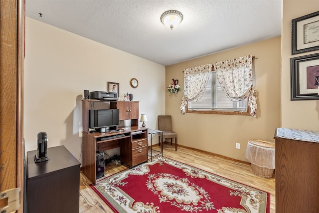 2804 Harmony Ct, Missoula, MT 59801 - office area featuring light wood-style floors and a textured ceiling