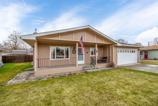 2804 Harmony Ct, Missoula, MT 59801 - view of front of house featuring covered porch, stucco siding, an attached garage, and driveway