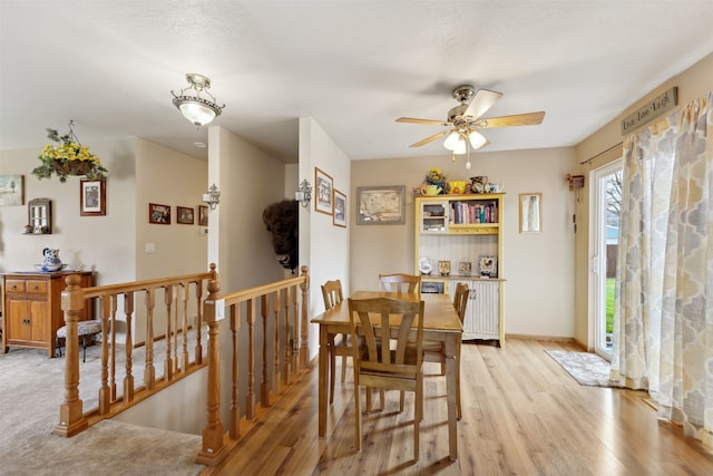 2804 Harmony Ct, Missoula, MT 59801 - dining space featuring light wood-style flooring, a ceiling fan, and baseboards