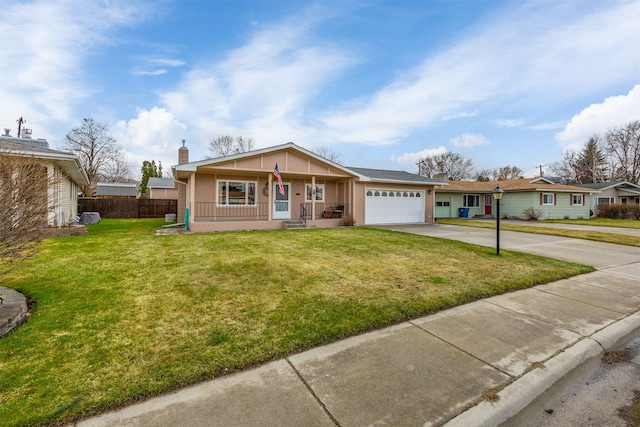 2804 Harmony Ct, Missoula, MT 59801 - ranch-style house featuring a porch, a chimney, driveway, and an attached garage