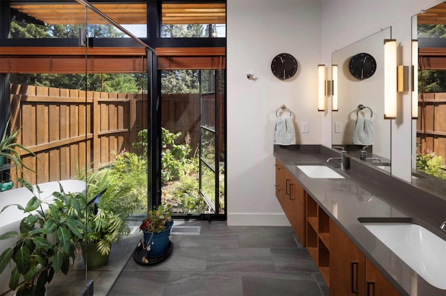 bathroom with double vanity and a sink