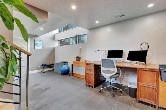tiled office with recessed lighting, visible vents, and baseboards